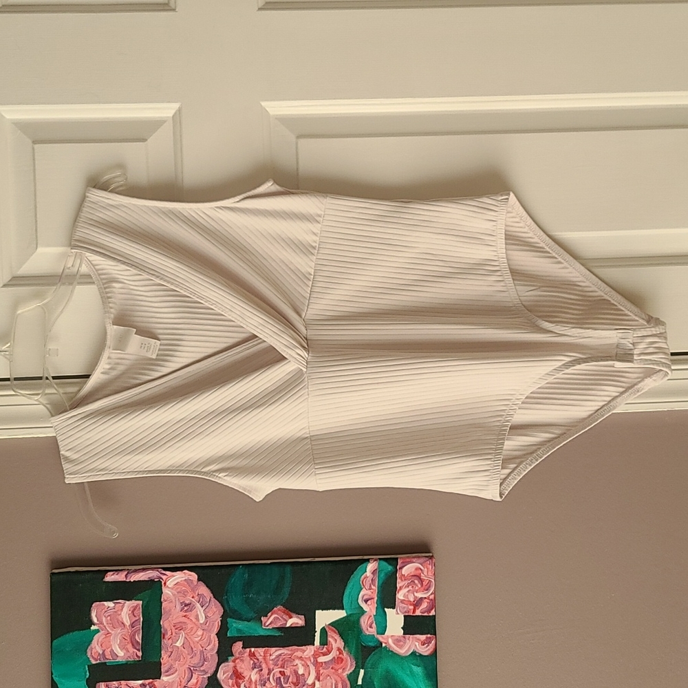 White snap bodysuit